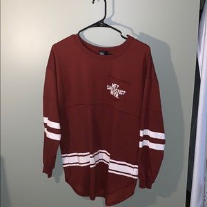 Reddish brown football striped shirt